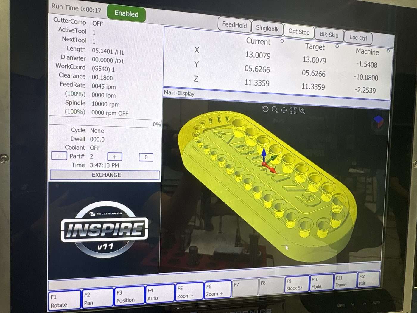 INSPIRE+ control screen displaying the part program during an automated machining cycle